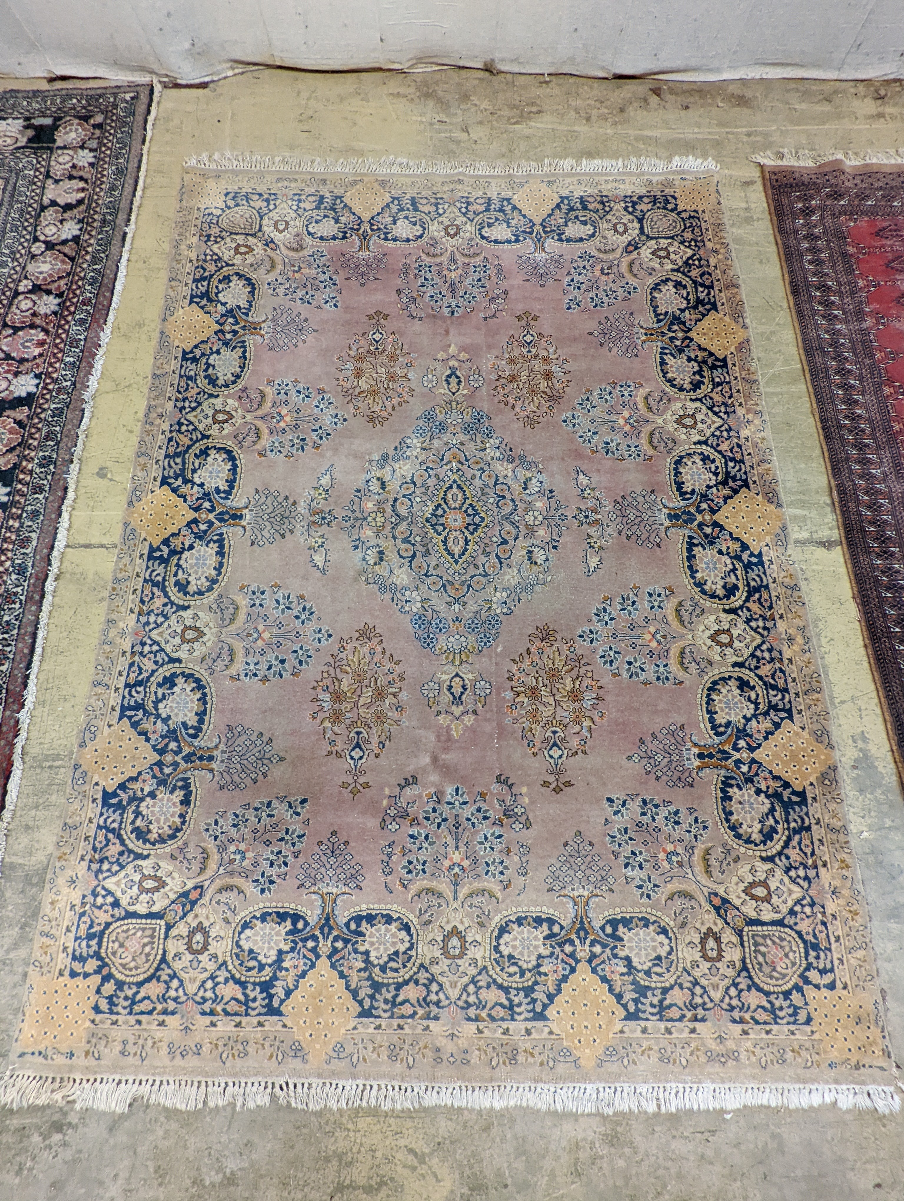 A North West Persian design peach ground carpet, 250 x 170cm